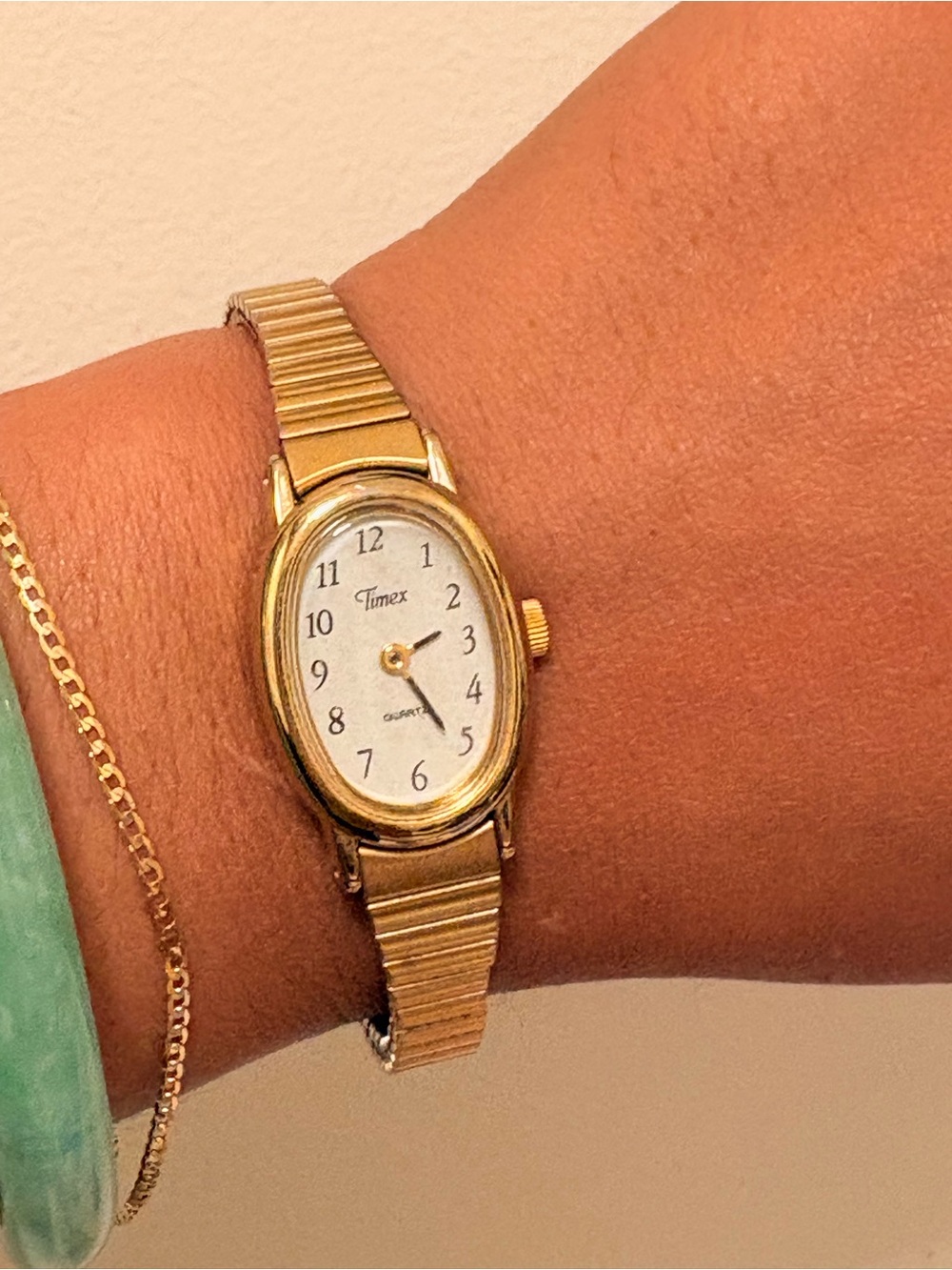 Timex Women's Gold-Tone Oval Bracelet Watch with White Dial
